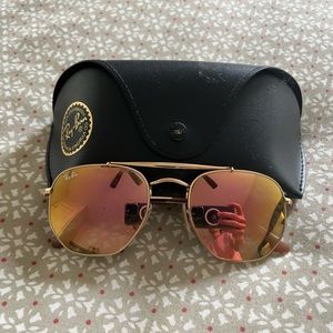 Ray Ban sunglasses.